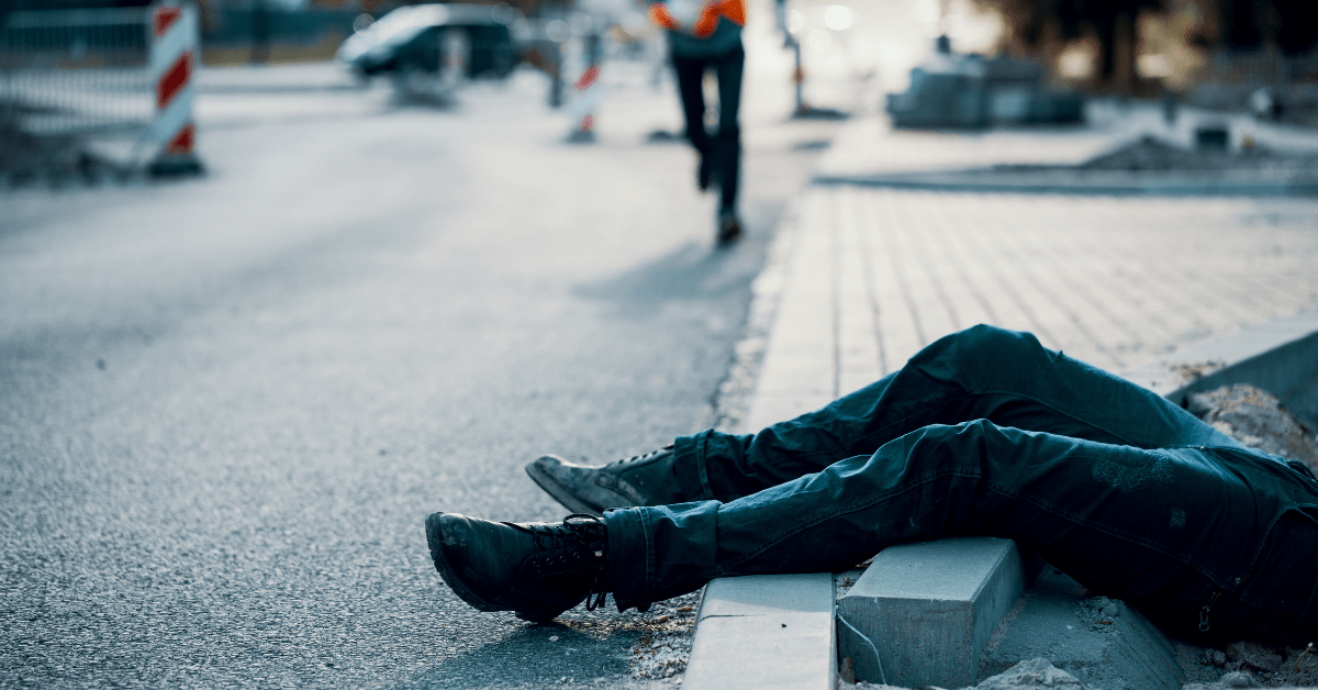 Man Lay Down on the Road - Bryan Garrett Personal Injury Attorney